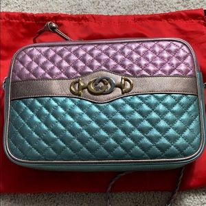 Authentic Gucci Metallic Bag NWOT.